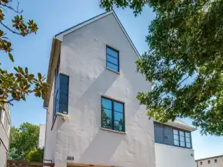 Sleek, Modern Living with Rooftop Deck and Entertaining Space