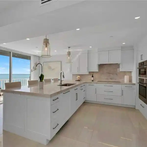 TRANSFORMED BEACHFRONT UNIT IN BAY COLONY