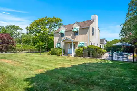 Serene Quogue Estate with Gated Entrance and Pool