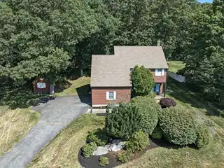 Meticulously Maintained and Improved Home in Coveted Squire's Glen
