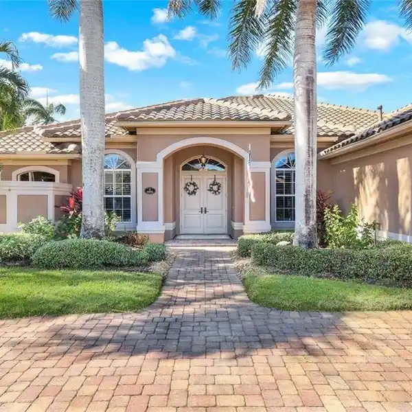 CUSTOM ESTATE HOME IN DESIRABLE LELY ISLAND ESTATES