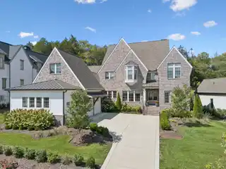 Modern Tudor-Style Brick Home in the Grove