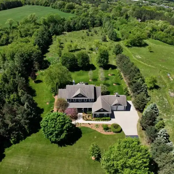 ENCHANTING HOME ON A PRIVATE WOODED LOT