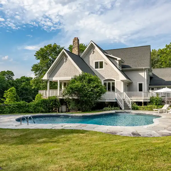 TURNKEY OASIS IN A COVETED ESTATE AREA