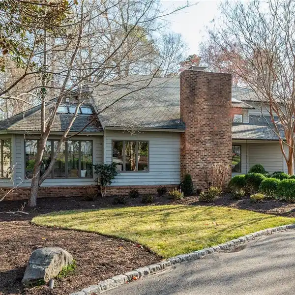 UNIQUE MID-CENTURY MODERN HOME IN COVETED NEIGHBORHOOD