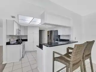 Florida Waterfront Comfort with Screened Lanai