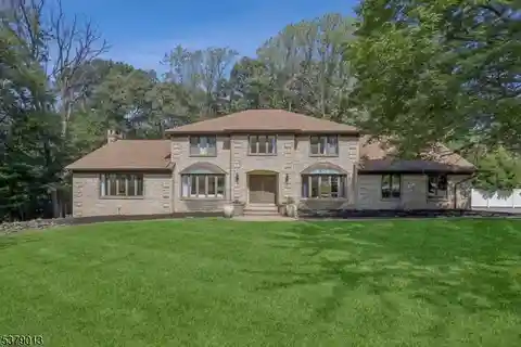 Stunning Residence on a Private Wooded Lot