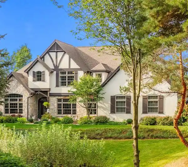 EUROPEAN-STYLE  RESIDENCE ON EIGHT WOODED ACRES