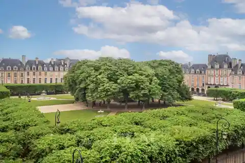 Duplex Apartment Overlooking Place Des Vosges