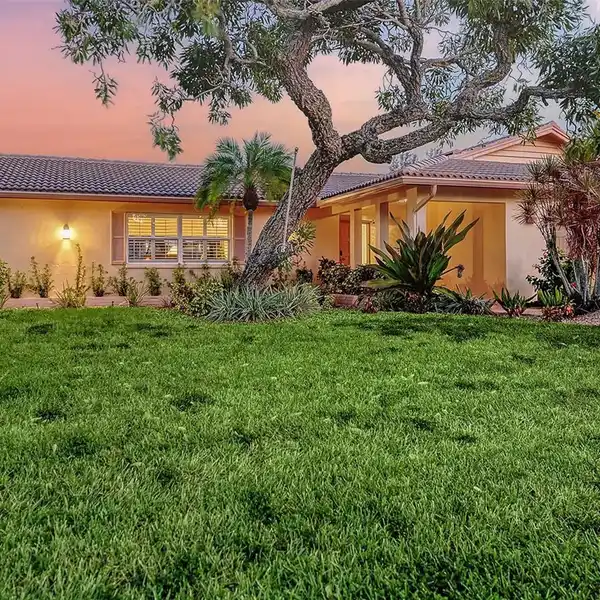 CLASSIC CANAL-FRONT MASONRY BEACH HOME