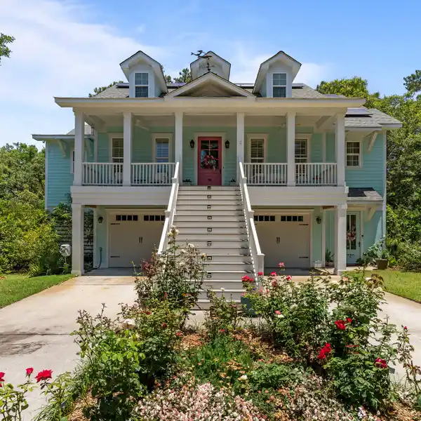 CUSTOM-BUILT ELEGANCE WITH PREMIUM UPGRADES IN CASWELL BEACH, NC
