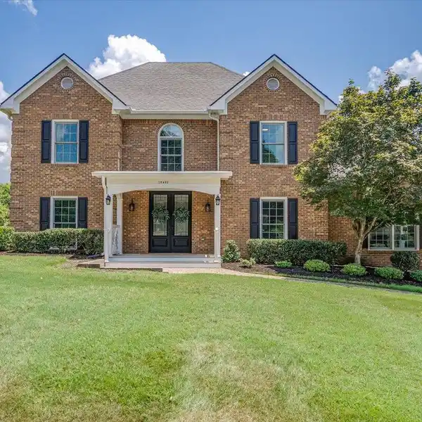 STUNNING BRICK HOME WITH FINISHED BASEMENT