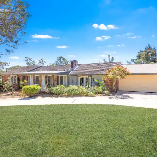 SINGLE-LEVEL RESIDENCE ON OVER SIX ACRES