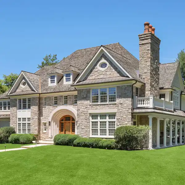 LIGHT-FILLED MODERN STONE AND CLAPBOARD HOME