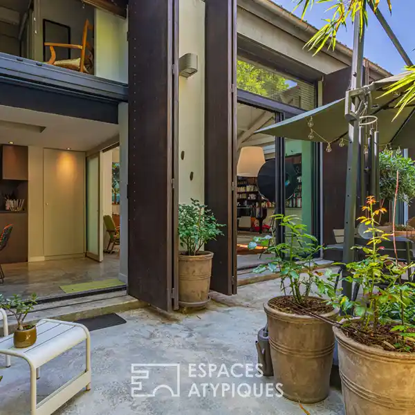 SPACIOUS CONTEMPORARY LOFT WITH LUSH PRIVATE PATIO