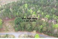 NEW CONSTRUCTION OPPORTUNITY IN A PRIVATE WOODED SETTING