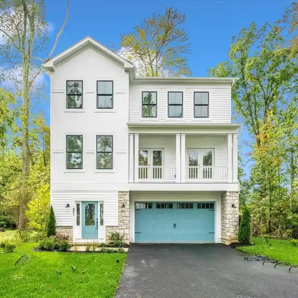 PRIMARY SUITE WITH SWEEPING WATER VIEWS AND SPA-INSPIRED BATH