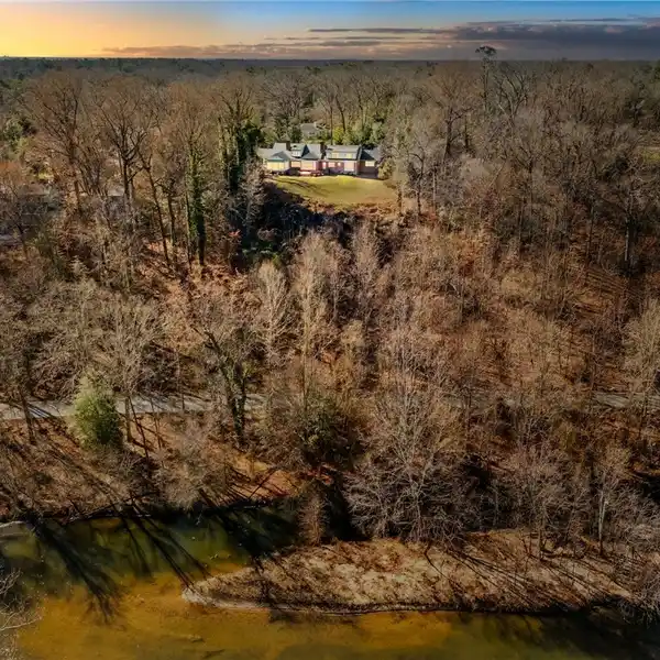 FINELY DETAILED COLONIAL REVIVAL-STYLE RANCH HOUSE