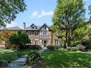 Elegant Tudor with Designer Kitchen and Parkside Charm