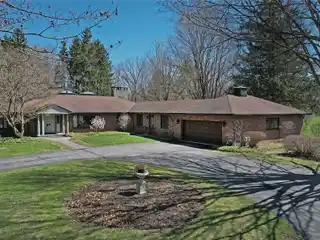 Stately Brick Ranch on over Seven Acres