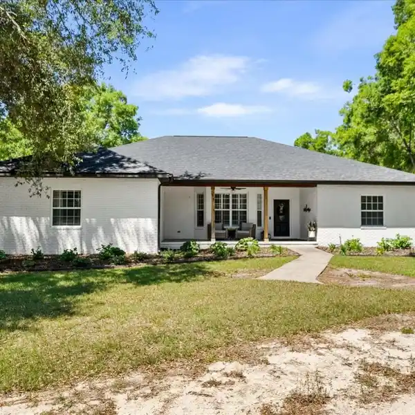 BEAUTIFULLY UPDATED POOL HOME ON OVER NINE ACRES