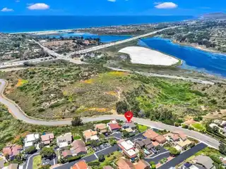 Breathtaking Coastal Living from Rare Corner-Lot Skyloft Home