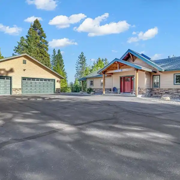 REFINED MOUNTAIN LIVING ON TWO LEVEL ACRES