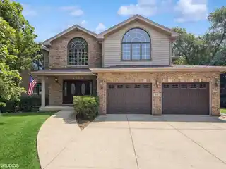Brick Beauty with Backyard Oasis
