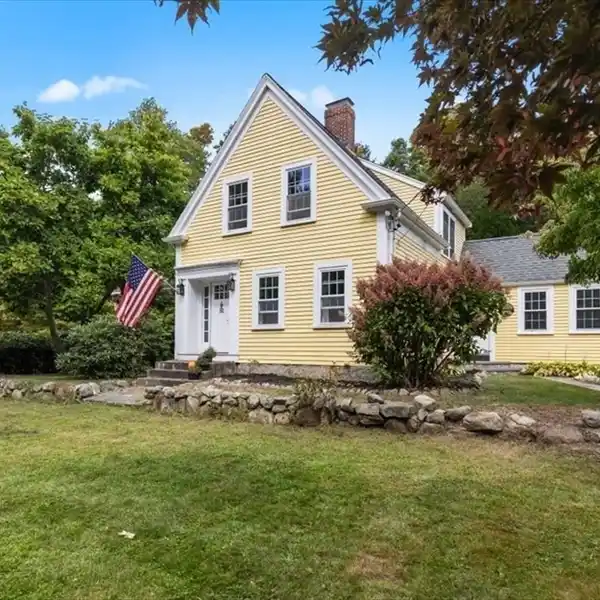 NEW ENGLAND FARMHOUSE ON A LARGE LEVEL LOT