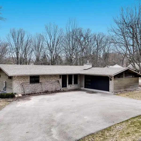 THOUGHTFULLY UPDATED YEAR-ROUND RANCH ON A CORNER LOT
