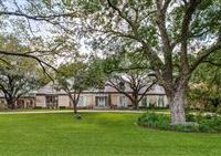 STATELY HOME IN A PARK-LIKE SETTING
