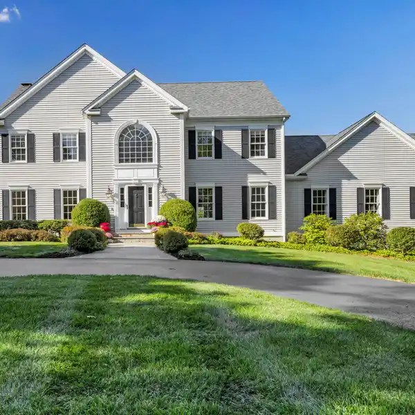 UPDATED AND WELL-MAINTAINED CLASSIC CENTER-ENTRANCE COLONIAL
