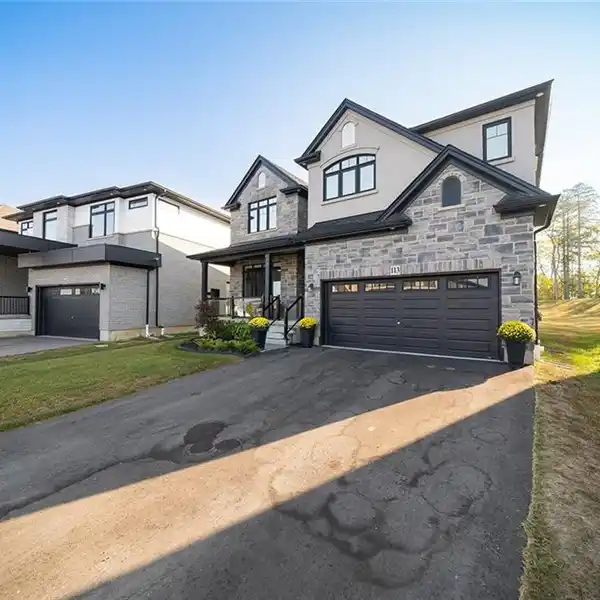STUNNING HOME ON A SERENE HALF-ACRE
