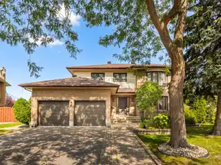 Meticulously Maintained Grilli Home with Large Deck