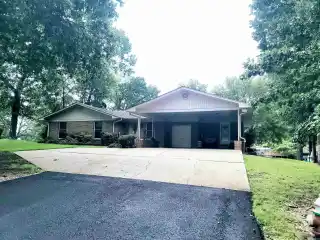 Tranquil Lakefront Gem with Endless Potential