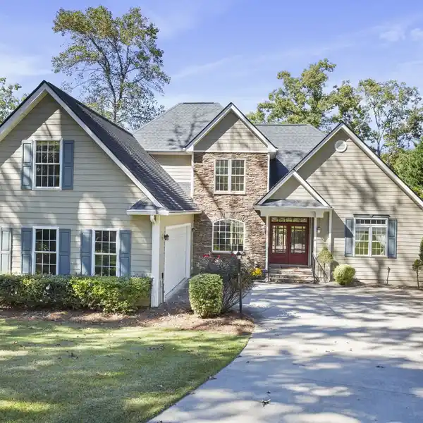 ELEGANT LAKEFRONT RETREAT WITH VAULTED GRANDEUR
