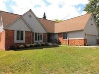 CONTEMPORARY COLONIAL ON A LARGE LOT