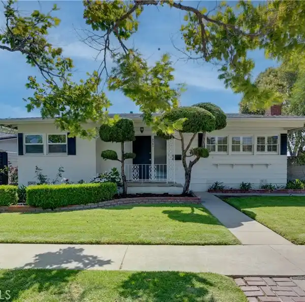 CHARMING HOME ON A DESIRABLE CORNER LOT