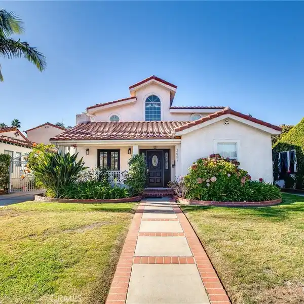 ELEGANT ESTATE WITH EXPANSIVE DUAL-LOT GROUNDS