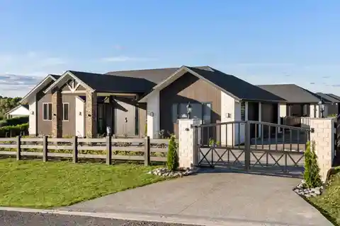North-Facing Brick Estate with Triple Garage