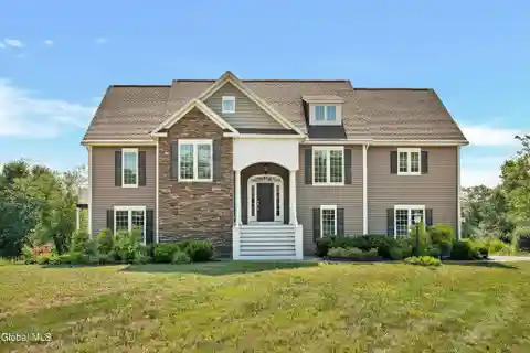 Comfortable Riverfront Living on over Three Acres