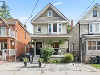 Charming Detached Home with Landscaped Outdoor Oasis