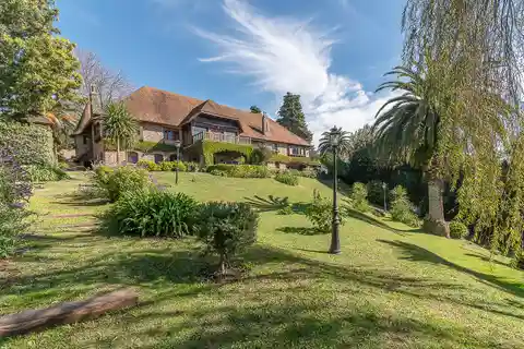 Iconic Patagonian Style Mansion on a Private Acre