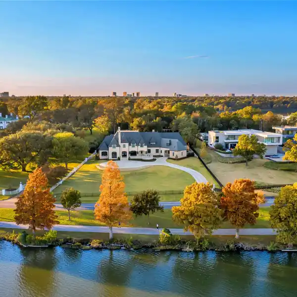 EXCEPTIONALLY DESIGNED FRENCH TRANSITIONAL HOME ON AN UNPARALLELED GATED LOT