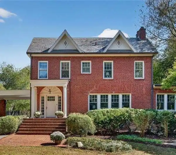 STATELY ESTATE WITH TIMELESS ELEGANCE AND CASCADING WATERFALL