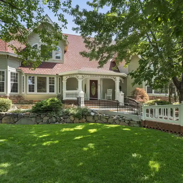 WONDERFUL VICTORIAN-INSPIRED CUSTOM HOME IN IDEAL LOCATION