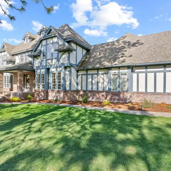 ENGLISH TUDOR ESTATE ON A SECLUDED LOT