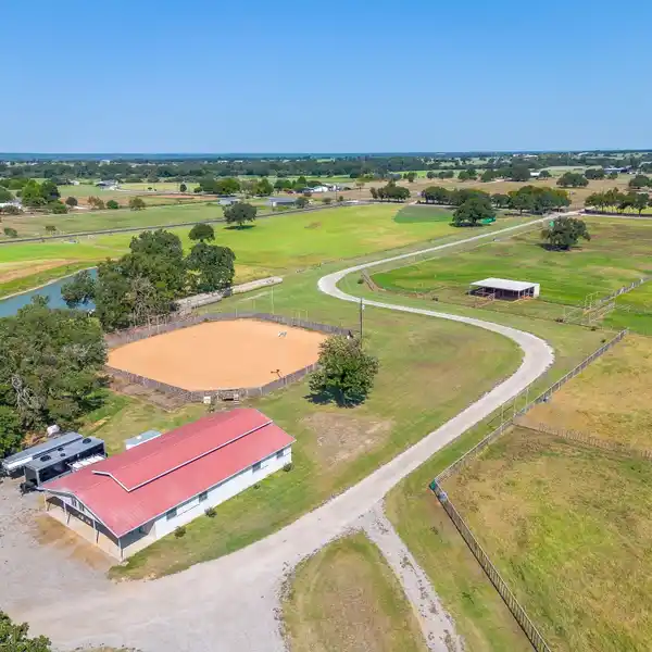 TURNKEY EQUESTRIAN ESTATE WITH ARENA AND BARN