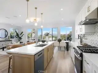 Designer Home Featuring European Cabinetry and Oak Doors