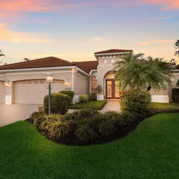 REFRESHINGLY APPOINTED ONE-STORY LAKEFRONT RESIDENCE